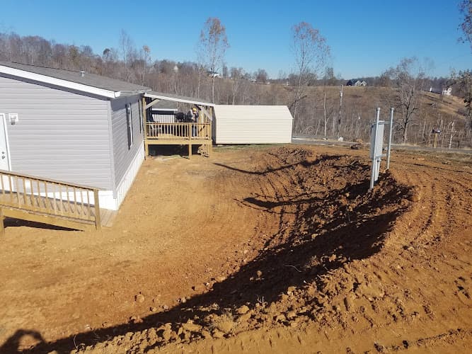 Earthworx excavating and property maintenance business photo